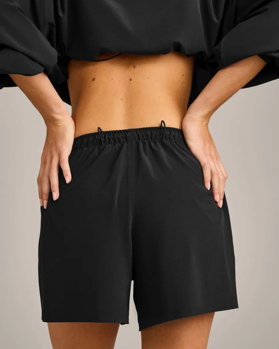 AirMove™ Lined Shorts 4" with Pocket and Reflective Logo