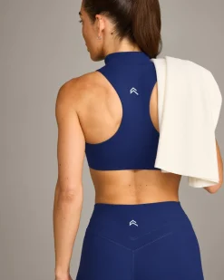EasyLift™ Zip High Neck Sports Bra with Grey Logo