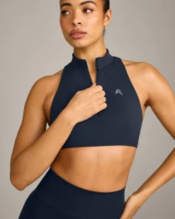EasyLift™ Zip High Neck Sports Bra with Grey Logo