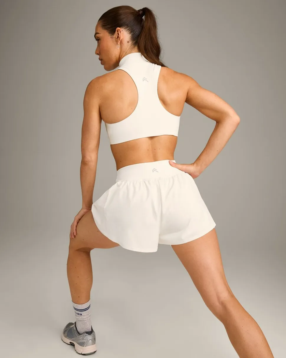 EasyLift™ Zip High Neck Sports Bra with Grey Logo
