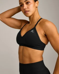 EnhanceLift™ Seamless Strappy Sports Bra with Grey Logo
