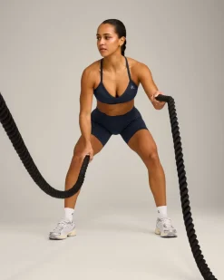EnhanceLift™ Seamless Strappy Sports Bra with Grey Logo