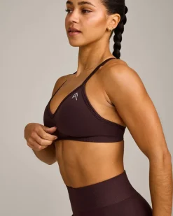EnhanceLift™ Seamless Strappy Sports Bra with Grey Logo