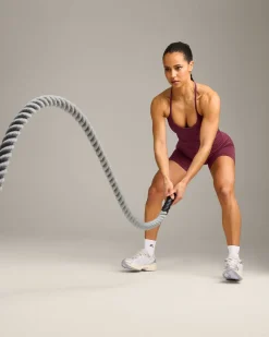 EnhanceLift™ Seamless Strappy Racer Vest with Built in Bra Shelf with Grey Logo