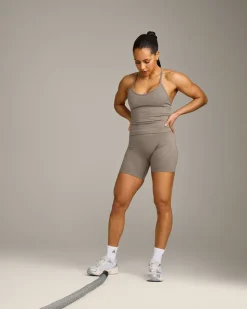 EnhanceLift™ Seamless Strappy Racer Vest with Built in Bra Shelf with Grey Logo