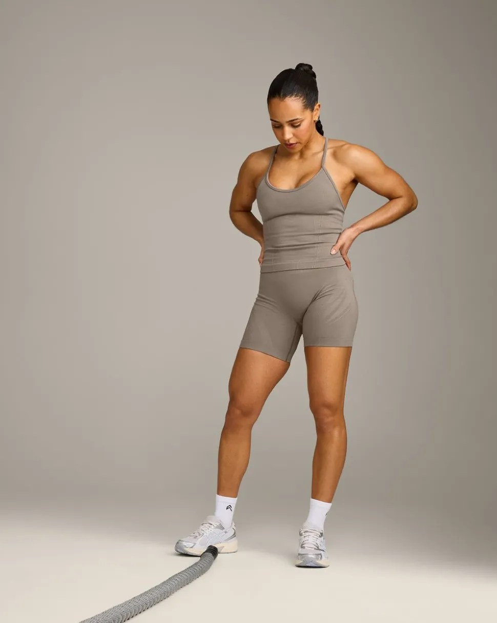 EnhanceLift™ Seamless Strappy Racer Vest with Built in Bra Shelf with Grey Logo