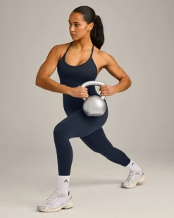 EnhanceLift™ Seamless Strappy Racer Vest with Built in Bra Shelf with Grey Logo