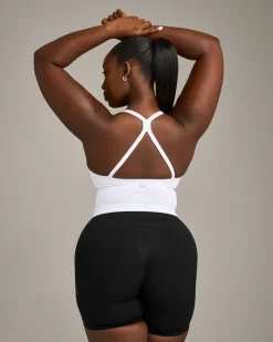 EnhanceLift™ Seamless Strappy Racer Vest with Built in Bra Shelf with Grey Logo