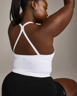 EnhanceLift™ Seamless Strappy Racer Vest with Built in Bra Shelf with Grey Logo
