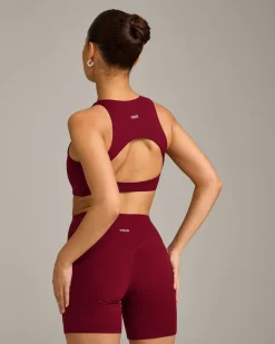 SoftMotion™ High Neck Sports Bra with Grey Logo