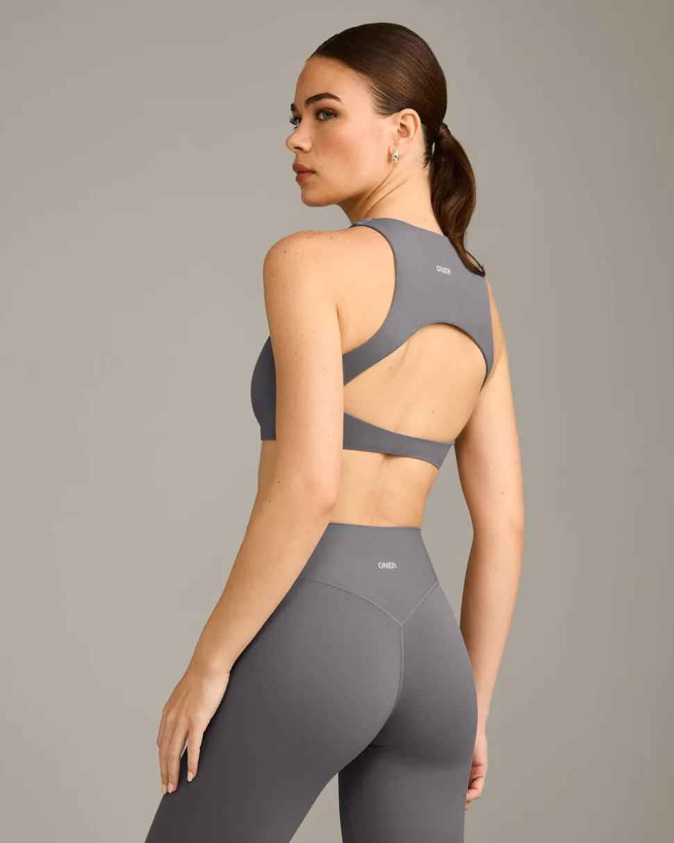 SoftMotion™ High Neck Sports Bra with Grey Logo