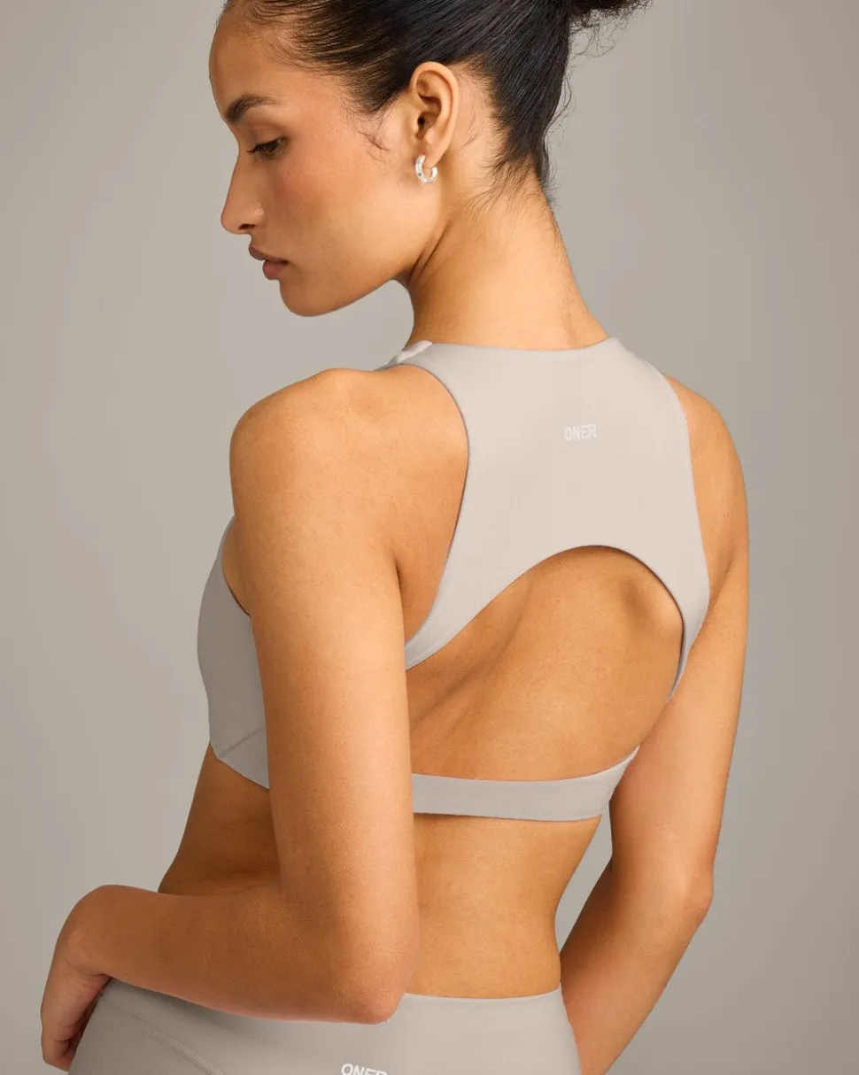 SoftMotion™ High Neck Sports Bra with White Logo