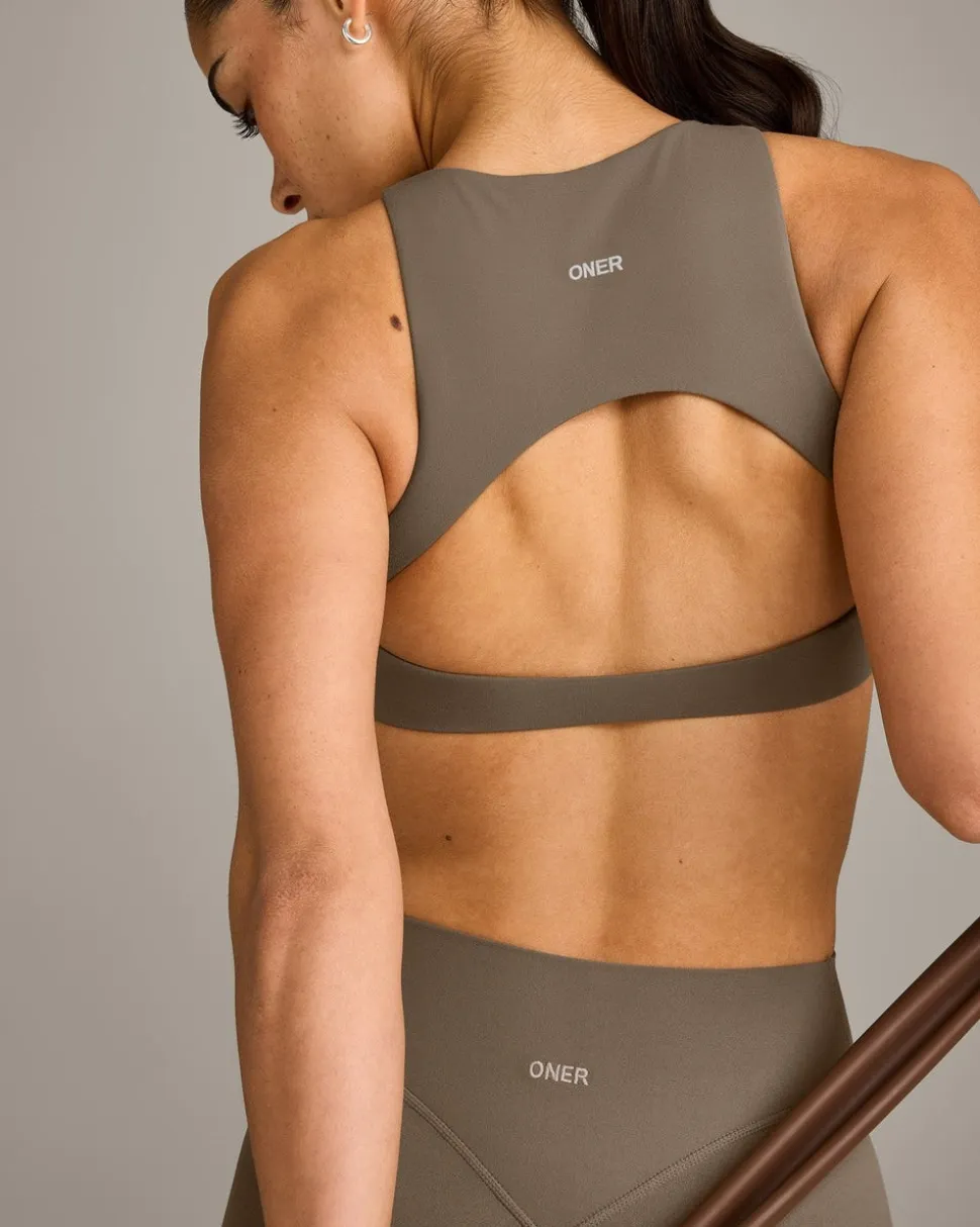 SoftMotion™ High Neck Sports Bra with Grey Logo