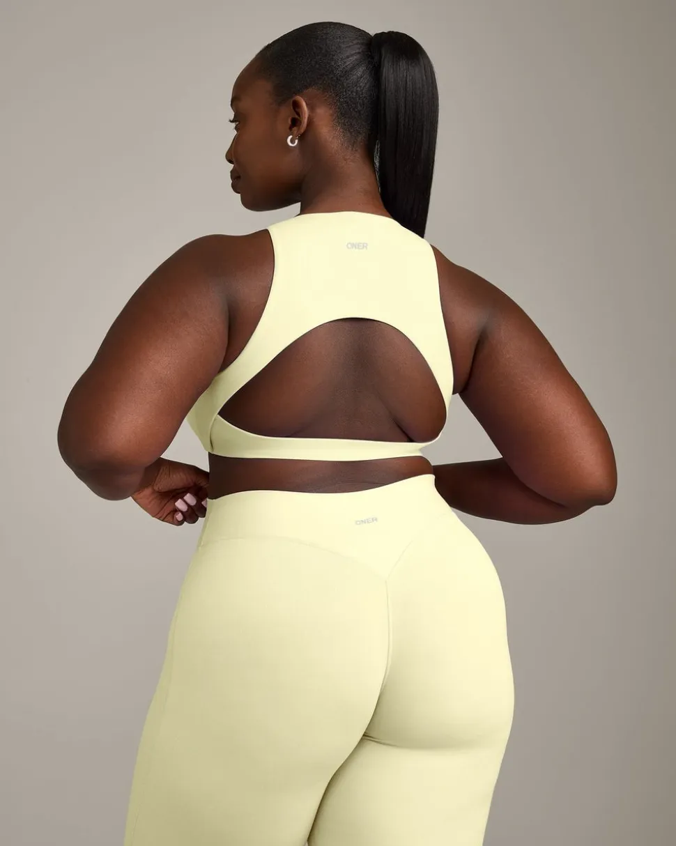 SoftMotion™ High Neck Sports Bra with Grey Logo