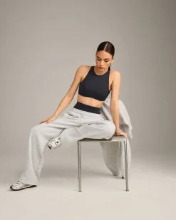SoftMotion™ High Neck Sports Bra with Grey Logo