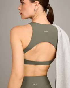 SoftMotion™ High Neck Sports Bra with Grey Logo