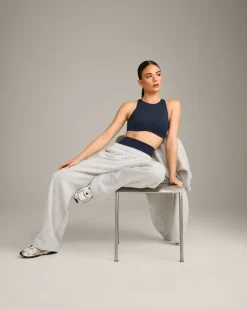 SoftMotion™ High Neck Sports Bra with Grey Logo