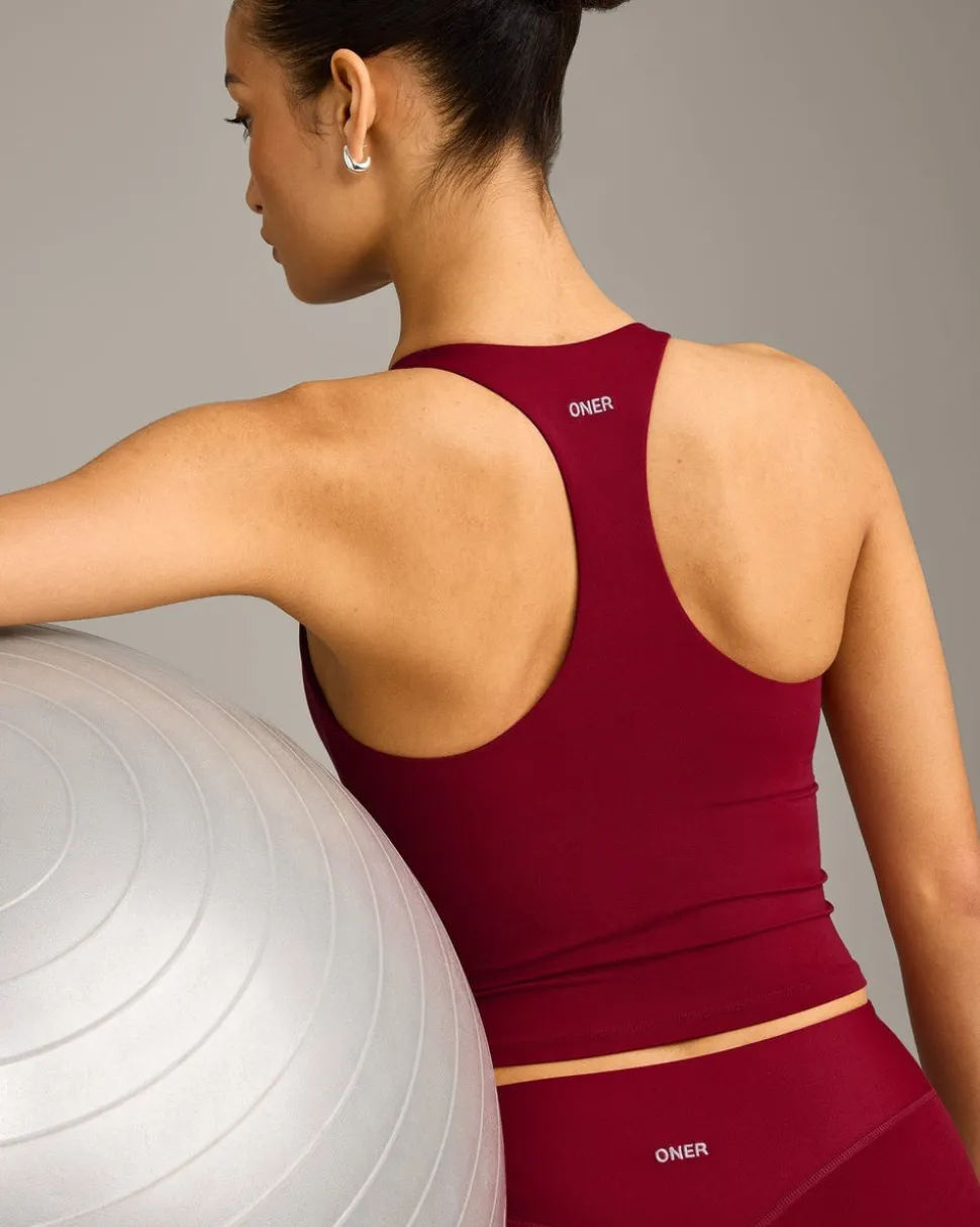 SoftMotion™ Racer Back Mid Vest with Built in Bra Shelf with Grey Logo