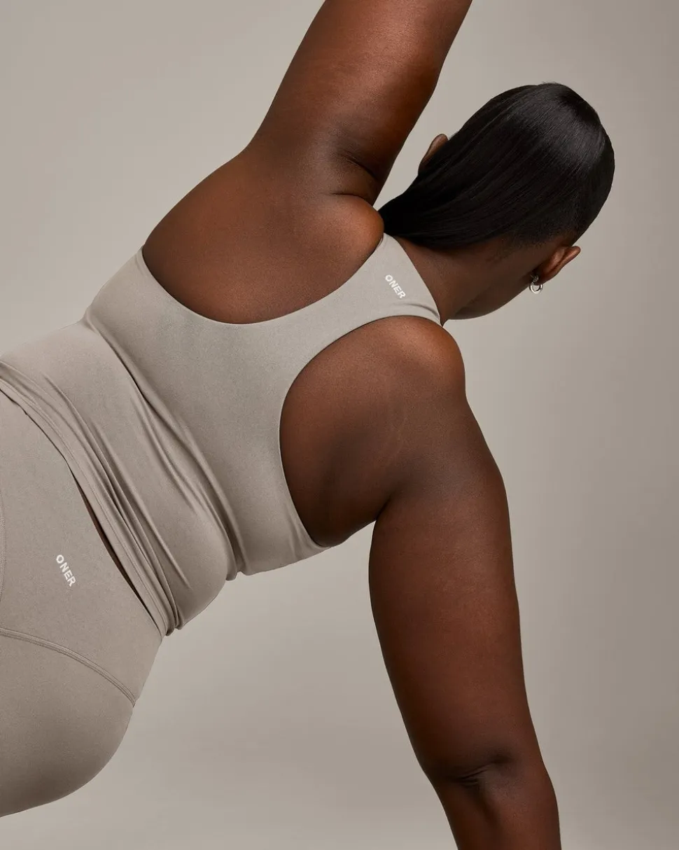 SoftMotion™ Racer Back Mid Vest with Built in Bra Shelf with White Logo