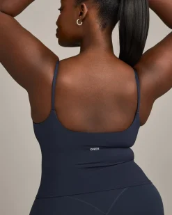 SoftMotion™ Strappy Mid Vest with Built in Bra Shelf with Grey Logo