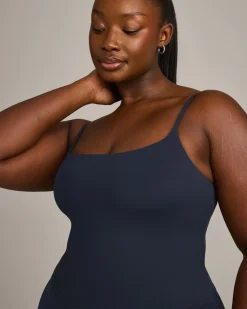 SoftMotion™ Strappy Mid Vest with Built in Bra Shelf with Grey Logo