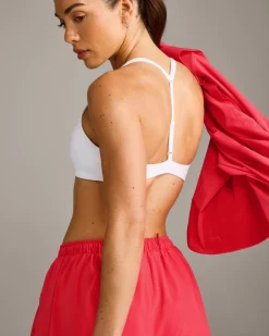 UnifiedMove™ T Back Minimal Bralette with Reflective Logo